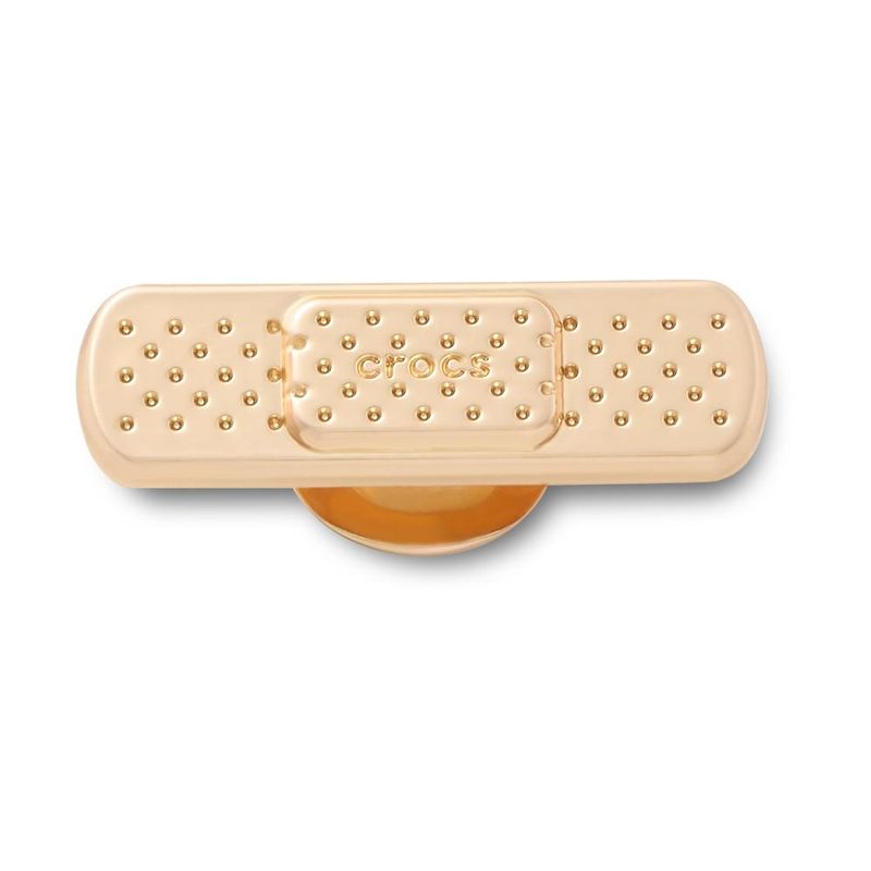 Jibbitz™ Bandagem Dourada UNICO